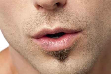 男迷人嘴唇的特写图像背景图片