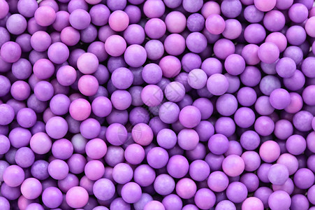粉色和紫色拖曳球背景图片
