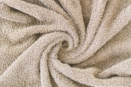 卷棕色spa毛巾背景图片