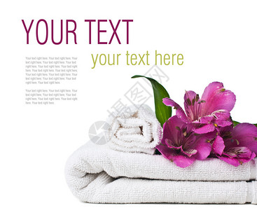 Spa和卫生概念白毛巾和鲜花孤图片