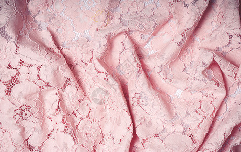 粉色蕾丝面料背景缝纫配件图片