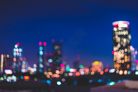 曼谷城市景观的模糊抽象夜间背景灯美图片