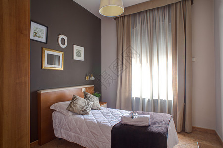 米兰阿瑞斯酒店的单人卧室背景图片