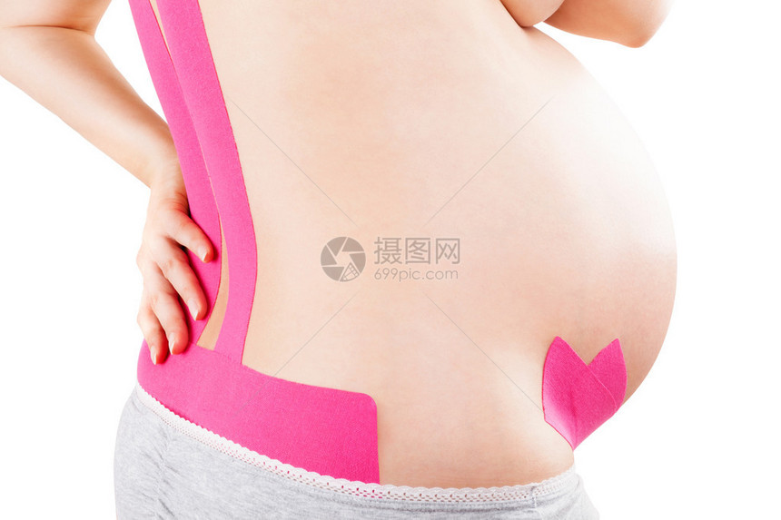 漂亮的孕妇背上带有动脉胶带图片