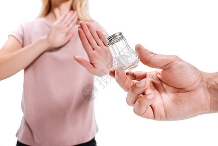 妇女拒绝将不健康盐单独隔离在白色图片