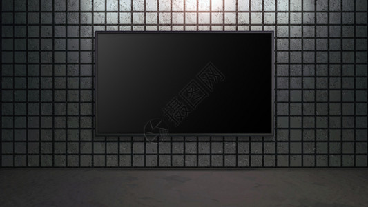 在砖墙上的空白宽银幕电视背景图片