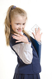 9岁的女孩穿9年校服拿着蓝色塑料夹子的学校图片