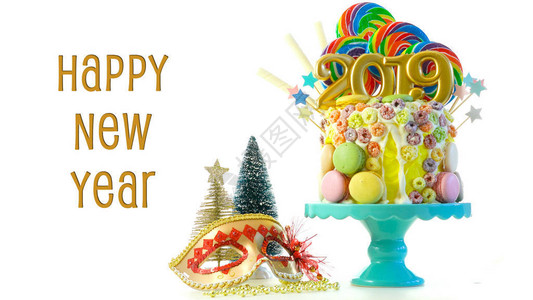 新年快乐糖田棒糖滴蛋糕2019个蜡烛在白色背景图片