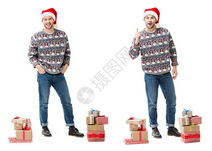 快乐的年轻男人带着一堆圣诞礼物指图片