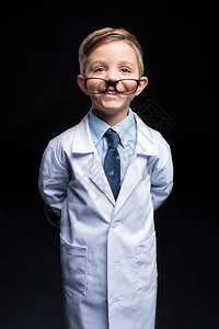 实验室大衣和眼镜中小男孩科学家鼻子图片