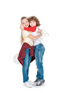 年轻男孩和女孩拥抱和享受在白色图片