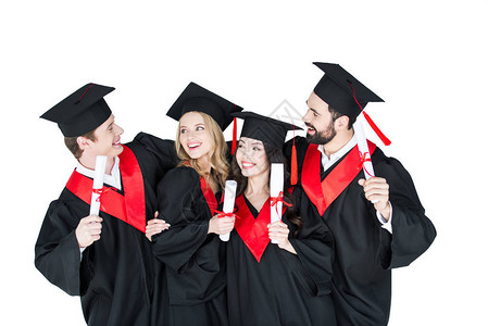 成绩优异的学生在学术帽子上站着带着孤图片