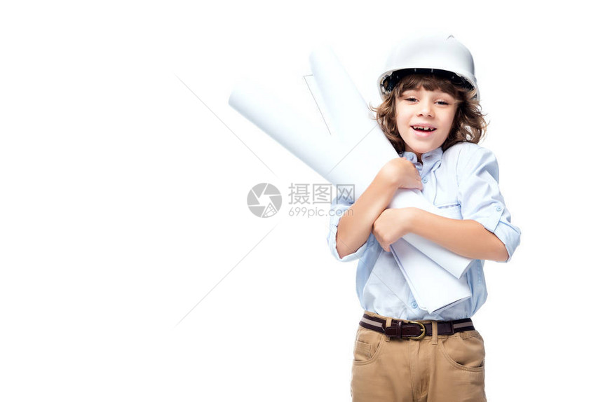 身着建筑师服装和头盔戴头盔的中学生男孩拥抱白图片