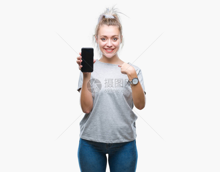 年轻金发女金发美女在孤立的背景中播放智能手机屏幕图片