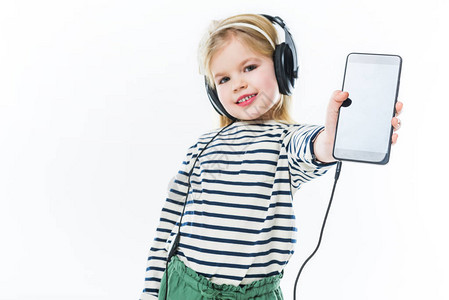 儿童快乐的小孩用耳机听音乐图片