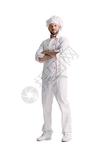 年轻的穿针结衣厨师手折臂在背景图片