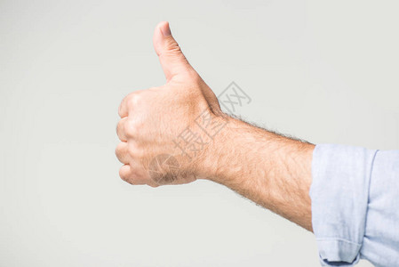 男手竖起大拇指的剪影被白色隔离图片
