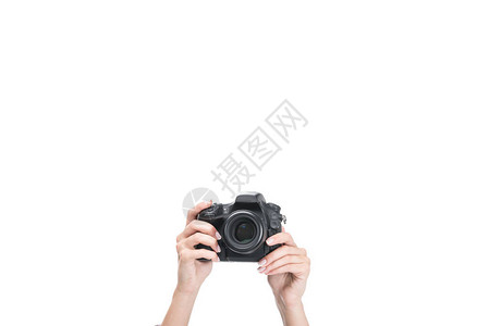 女手在专业照相机上拍摄照片的切成作物的画面背景图片