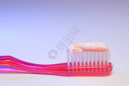 一种新的牙刷和牙膏牙科护理概念图片