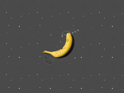 昏欲睡的香蕉与黑色小星的特写视图图片