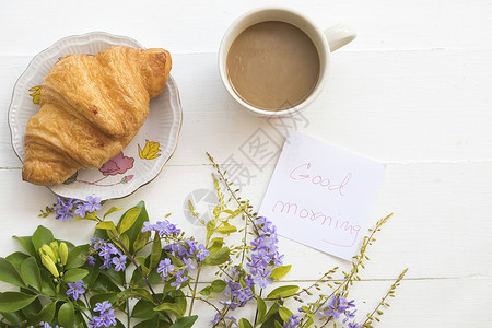 吃点心早饭和晨花早餐以白衣背图片