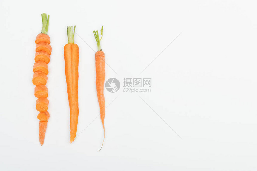 切胡萝卜切胡萝卜和整片胡萝卜的顶部视图图片