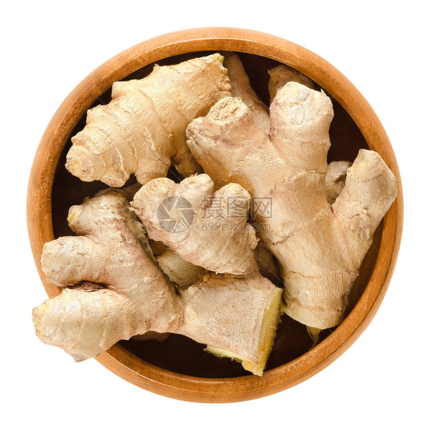 Ginger根植于木质碗中Zingiberofficinale的新鲜图片