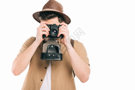 戴帽子的青年男子摄影师摄像头在图片