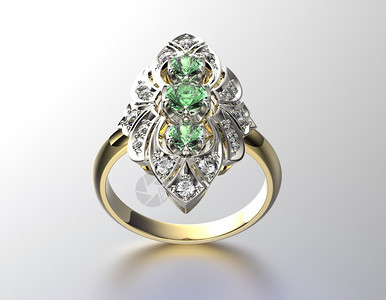 灰色背景上的祖母绿订婚戒指图片