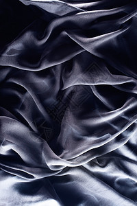 黑色纺织品上的黑色透明丝绸图片