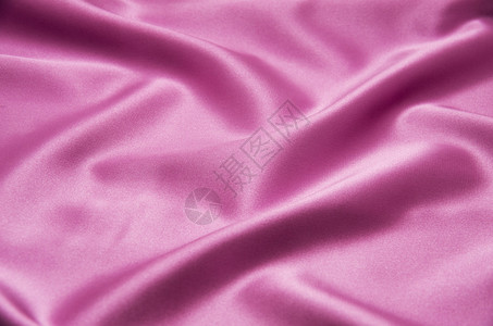 平滑优雅的粉色丝图片
