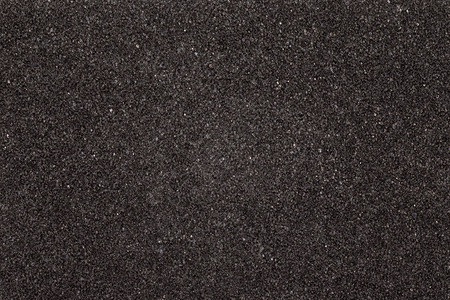 黑色泡沫纹理板软橡胶材料背景图片