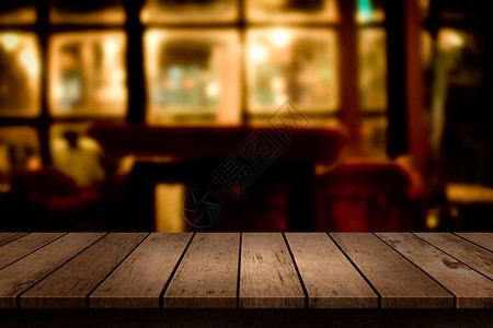 木桌餐厅背景模糊图片