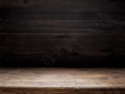 木桌和深色木墙烹饪背景背景图片