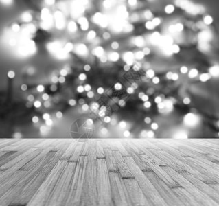 木地板和明亮的光模糊图片