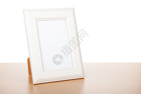 木板上的相片框白色背景上背景图片