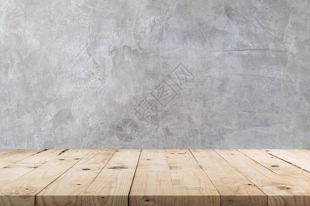 空木制桌和混凝土墙纹理及有复制空间的背景背景图片