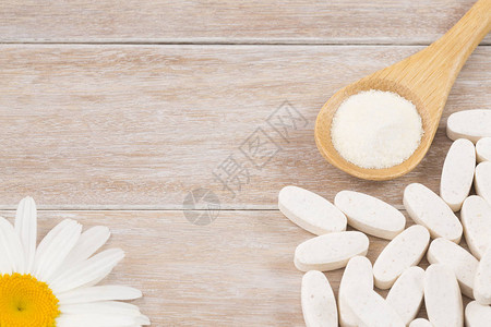 Pills和collagen蛋白质粉末图片