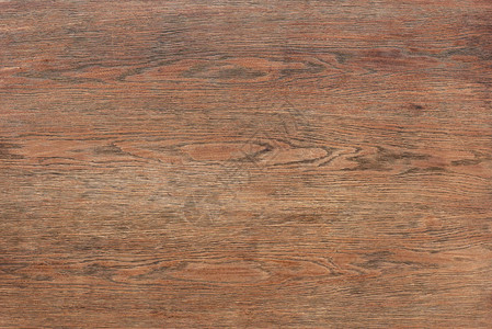 空棕色木制桌的背景图片