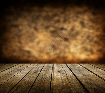 木甲板桌和深棕色背景图片