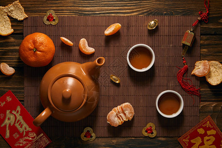 茶叶橘子和竹垫上传统装饰图片