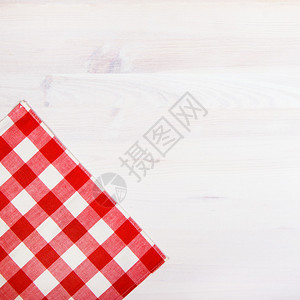 木制背景上的餐桌厨房餐巾图片