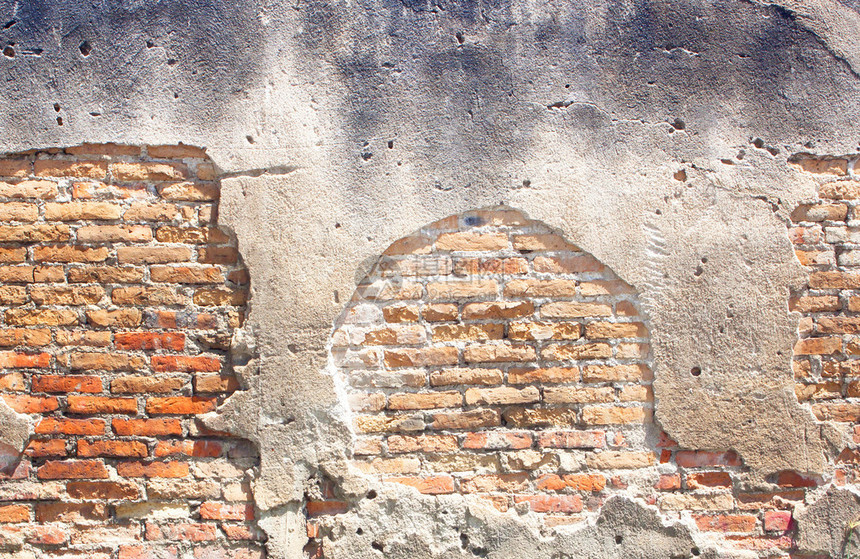 腐朽破裂的混凝土复古砖墙背景图片