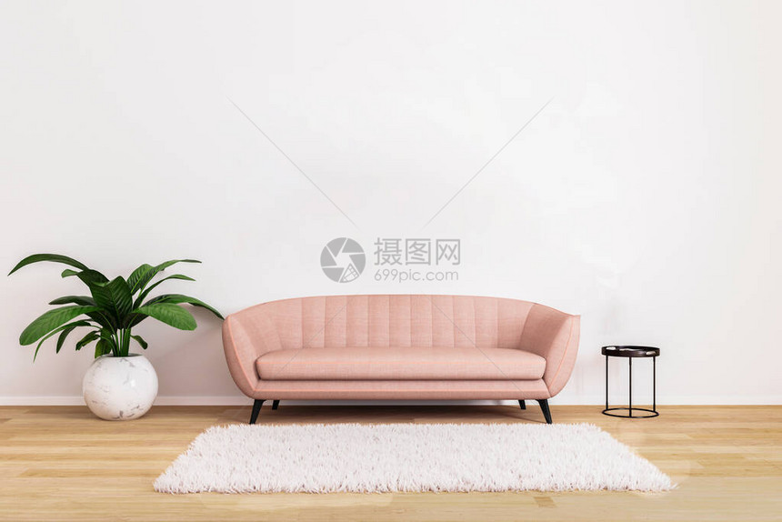 带黑色咖啡桌的粉红色沙发和植物在明亮的里图片