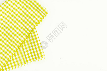 黄色布料厨房毛巾和格子图案孤立在白色背景上图片