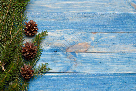 圣诞生锈背景年青蓝木板树枝和图片