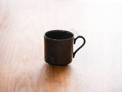 特写一张空的黑色瓷器或陶瓷茶或咖啡杯或子的背景照片图片
