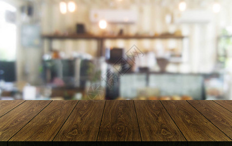 现代餐厅或咖啡店的木板背景模糊背景图片