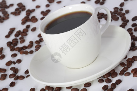 杯咖啡和豆角的度图片