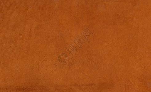 带纹理的浅棕色和橙色皮革背景背景图片